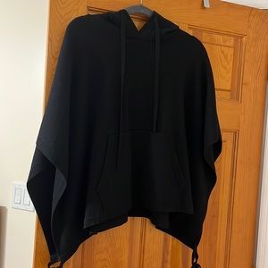 Lululemon hooded knit black poncho.  Lightly used.  Fits sizes up to 14.